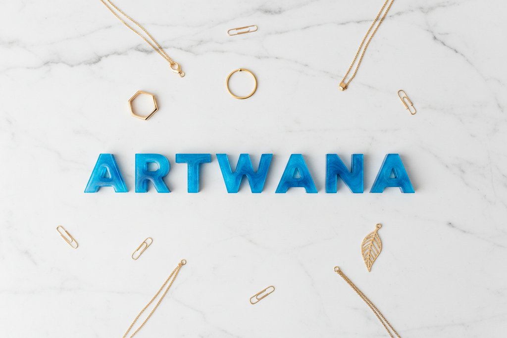 Brand Flat Lay - ARTWANA Letters with Gold Accessories